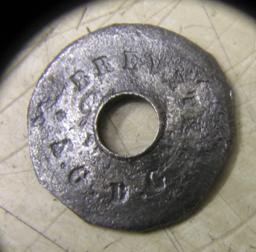 a closeup of a washer used on one of the lions