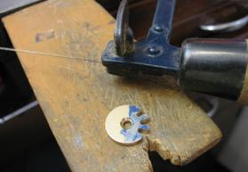 Blank racks in position to check tooth pitch against a scriber point height gauge.